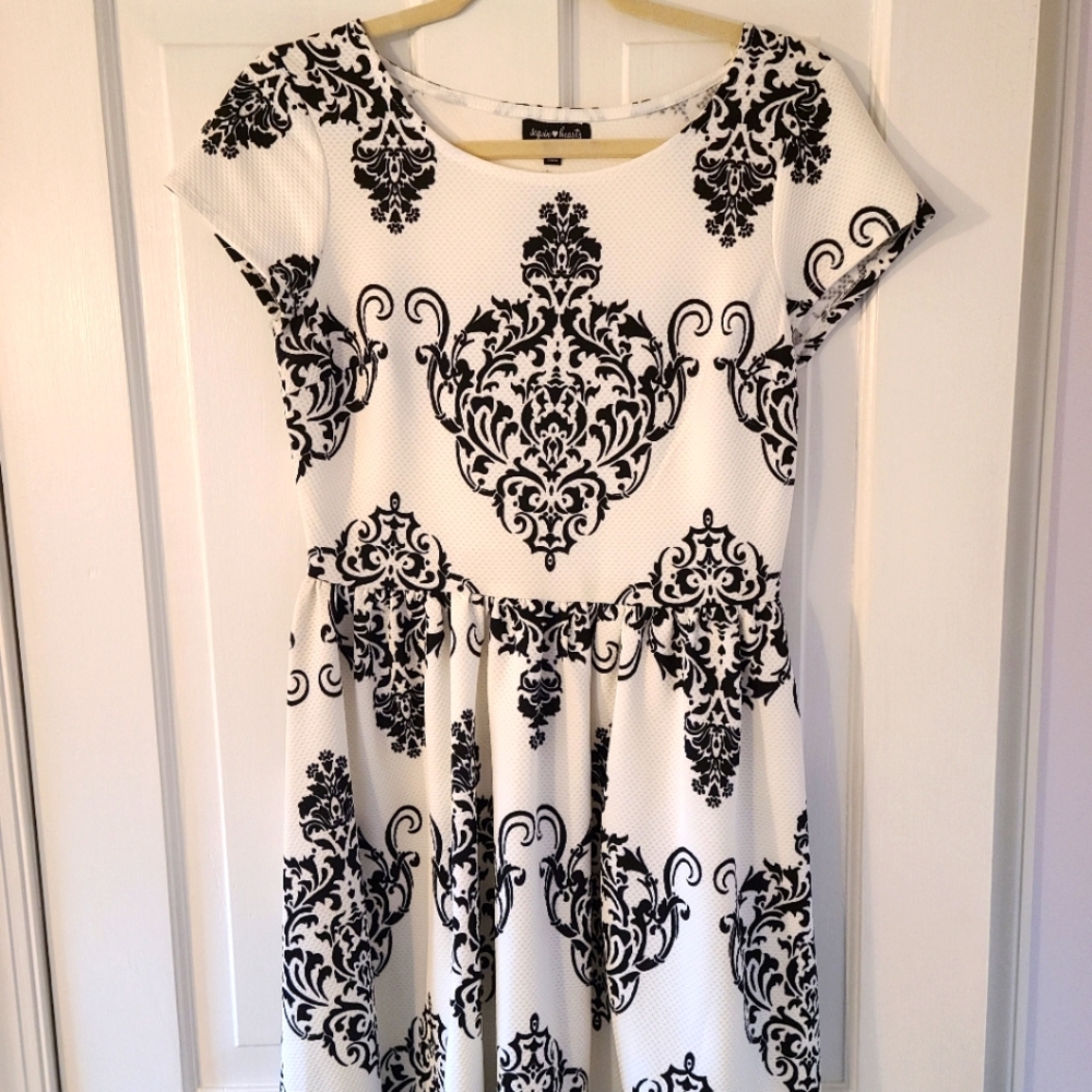 Elegant white and black cocktail dress